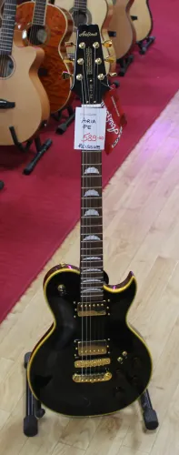 Aria Pro 2 PE - F80 Reissue Les Paul Shape Electric Guitar Black In stock Sarum Guitars & drums Salisbury sp1 1el